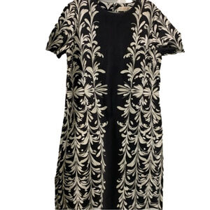 Tory Burch dress Medium navy white. Nylon -spandex  with a lot of stretch.